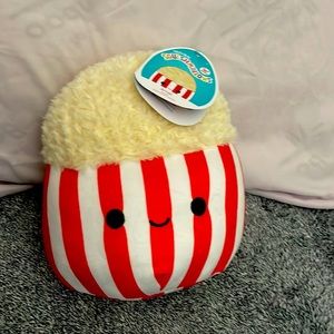 Im selling a squishmallow it is a popcorn super soft and his name is Arnel